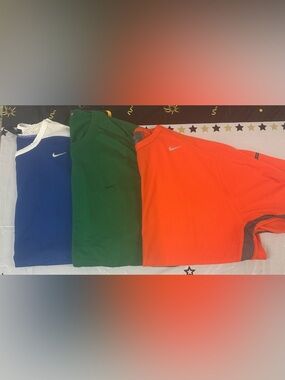 Three brand new Nike Sphere Short-Sleeve Mesh Tees in Green and Orange and Blue